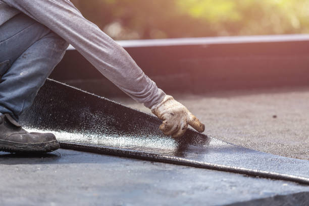 Professional Waterproofing technician working in Hood, VA